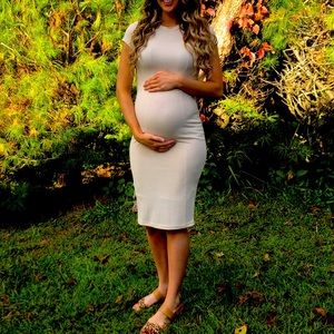 Maternity or fitted dress. Cream or beige.